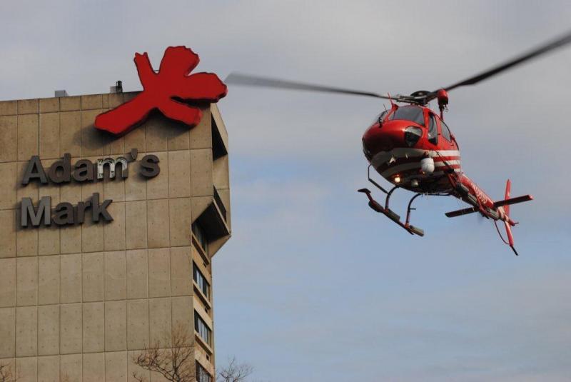 The Erie County Sheriff's Office Air One Helicopter lands at Buffalo's Adams Mark Hotel